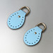 Blue semicircular stitched leather loops, 20 mm