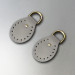 Light grey semicircular stitched leather loops, 20 mm