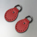 Red semicircular stitched leather loops, 20 mm