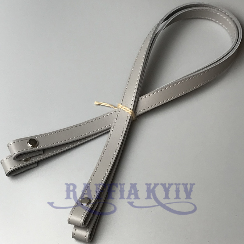 Light grey leather handles with bend on screws, 67×1.5 cm